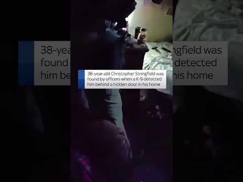 Suspect found behind hidden door