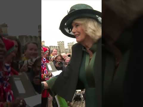 The King and Queen joke with well wishers following the Easter Sunday service in Windsor