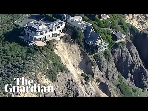 Drone footage shows Californian mansions on cliff edge after torrential rainfall