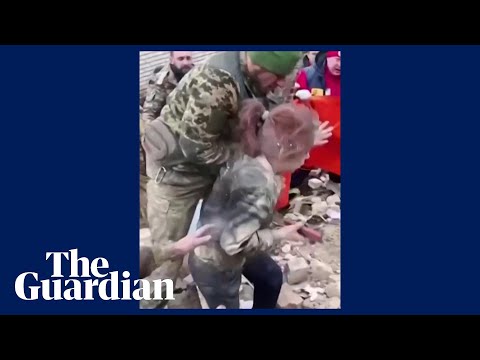 Woman pulled from rubble after Russian missiles hit Kharkiv