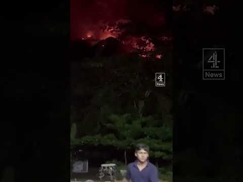 Hundreds evacuated as Indonesia volcano erupts in lightning