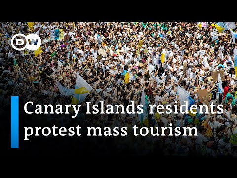 Protesters demand changes to mass tourism in Spain | DW News