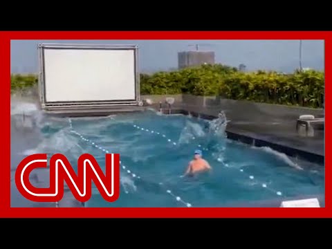 Video shows what happened when a man was swimming during the massive earthquake