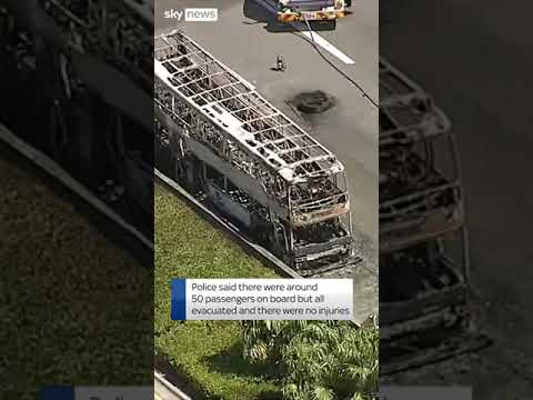 Dozens escape as tourist bus bursts into flames