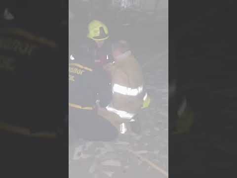 Firefighter cries after learning father was killed metres away