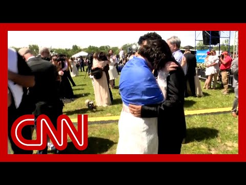 Multiple brides and grooms observe solar eclipse in Arkansas just after tying the knot