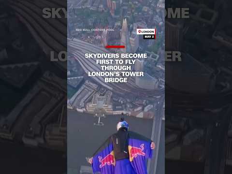 Skydivers become the first to fly through London’s Tower Bridge