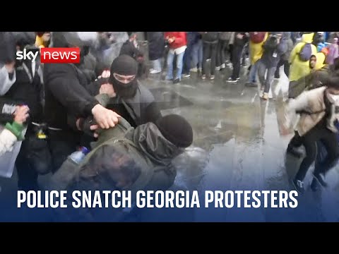 Protesters smash barriers at Georgia’s parliament after divisive bill passed