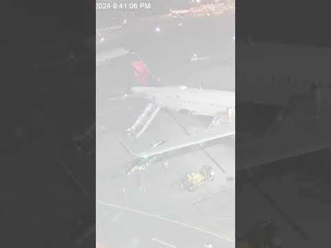 Plane catches fire after landing in the US