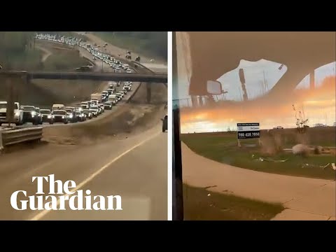 Canada wildfires: huge queues on highway as thousands evacuate oil town
