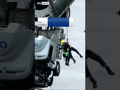 Kentucky: View from driver’s cabin hanging from bridge over Ohio River following collision