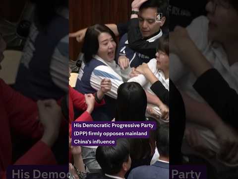 Violence breaks out in Taiwanese parliament in a dispute over reforms