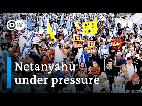 Thousands protest in Israel as cracks show in war cabinet | DW News