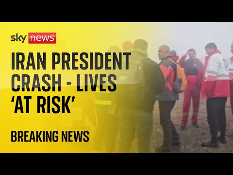 Lives of Iran’s president and foreign minister ‘at risk’ as search effort under way following crash