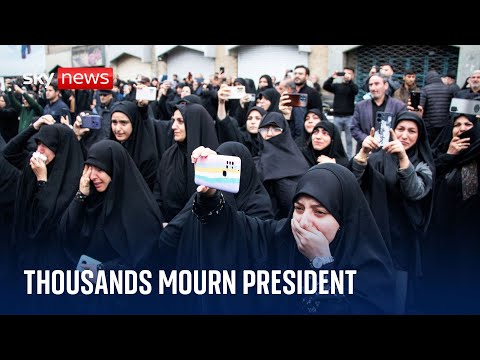 Thousands mourn Iran’s president and others celebrate his death