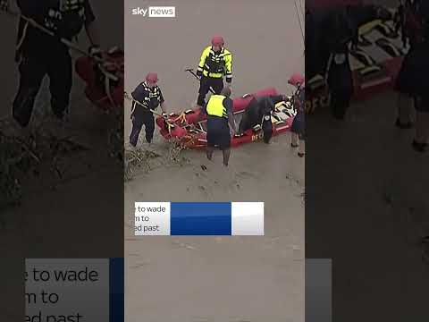 Stranded driver rescued from floodwaters