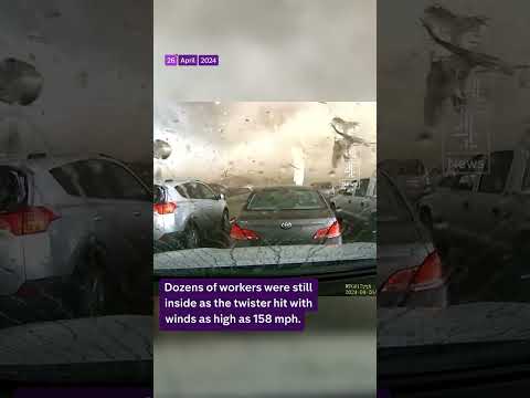 Newly released dashcam footage shows a tornado destroying a building in Nebraska in April.