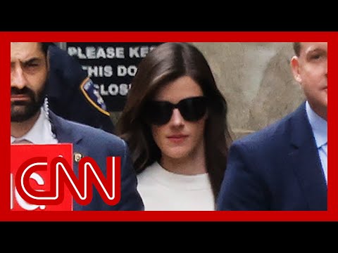 Ex-aide: Trump would sign checks while on phone, in meetings