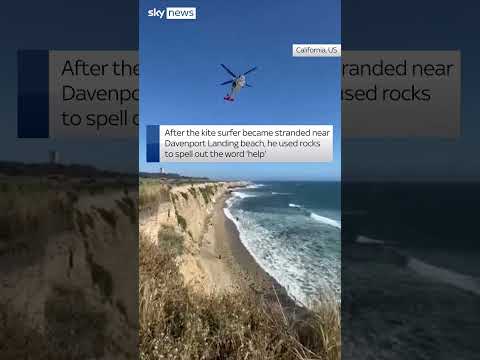 Kite surfer spells ‘help’ to get rescued