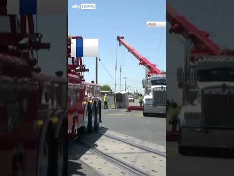 Sinkhole swallows trailer of truck