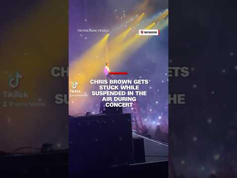 Video shows Chris Brown get rescued while suspended in air after malfunction