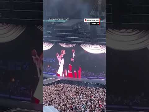 See what Travis Kelce did when Taylor swift brought him on stage