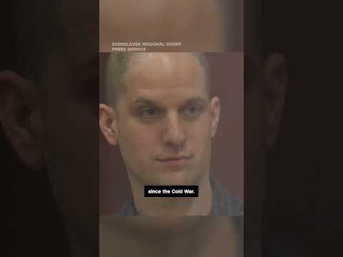 Evan Gershkovich appears in glass cage before closed trial