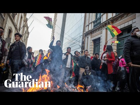Failed coup in Bolivia sees government supporters defend square from tanks and troops