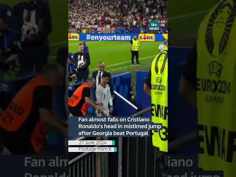 Fan almost falls on Cristiano Ronaldo’s head in mistimed jump after Georgia beat Portugal| ITV News