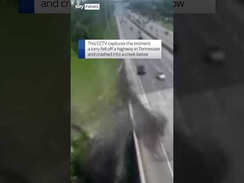 Moment lorry falls off highway
