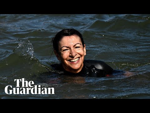 Paris mayor swims in the Seine to show it’s clean enough for Olympic swimming events