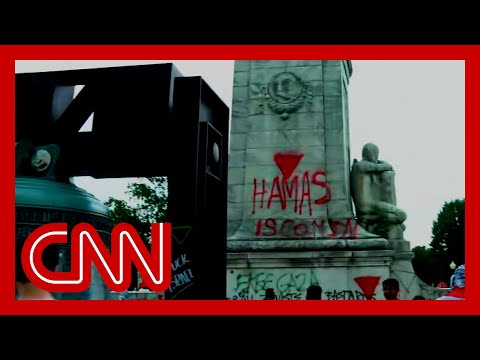 Flags burned, monuments graffitied and US flags replaced with Palestinian ones by protesters