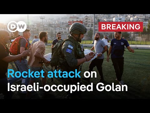 Ten people killed as rocket hits football pitch in Israeli-occupied Golan | DW News