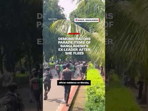 Demonstrators parade items of Bangladesh’s ex-leader after she flees