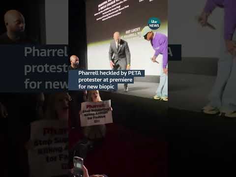 Pharrell heckled by PETA protester at premiere for new biopic #itvnews