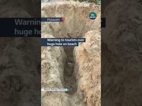 Warning to tourists over huge hole on beach | ITV News