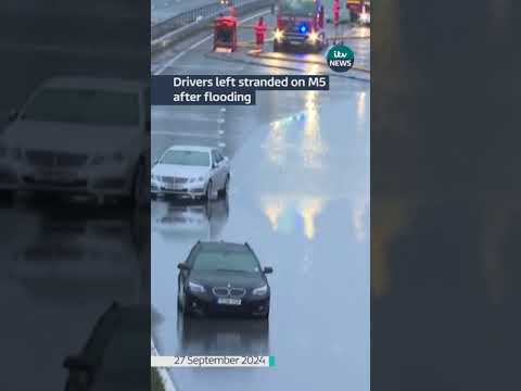 Delays on M5 after flooding closes road and leaves drivers stranded #itvnews #floods #m5