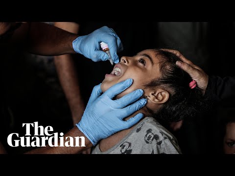 Children receive polio vaccination in Gaza after inoculation campaign begins