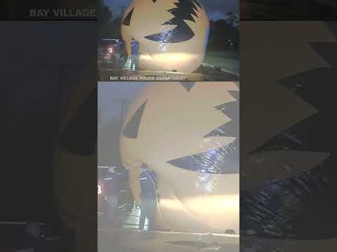 Ohio police officers swallowed up by giant Halloween decoration