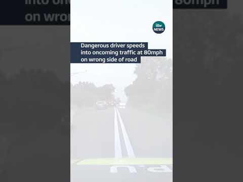 Dangerous driver speeds into oncoming traffic at 80mph on wrong side of road #itvnews #shorts