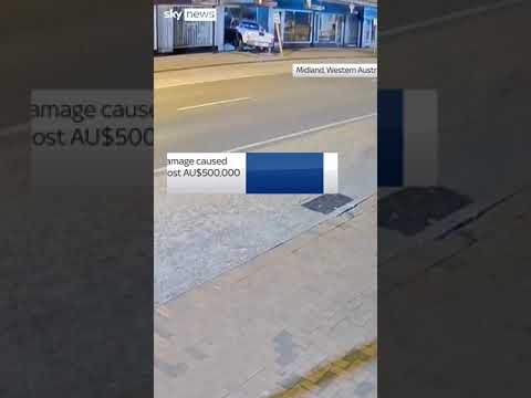 Truck rams into shop and bursts into flames