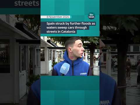 Spain struck by further floods as waters sweep cars through streets in Catalonia #itvnews #shorts