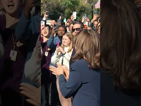 Harris returns to cheering staff at White House