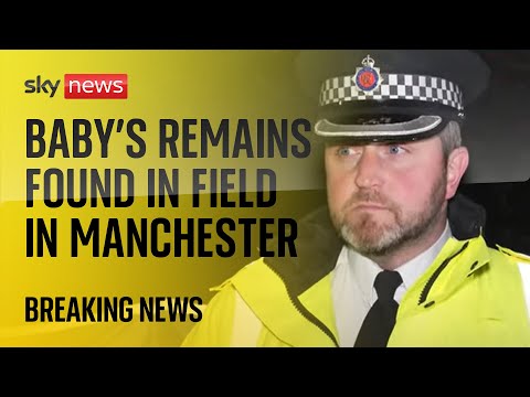 Police hold a news conference after a baby’s remains are found in a field in Manchester