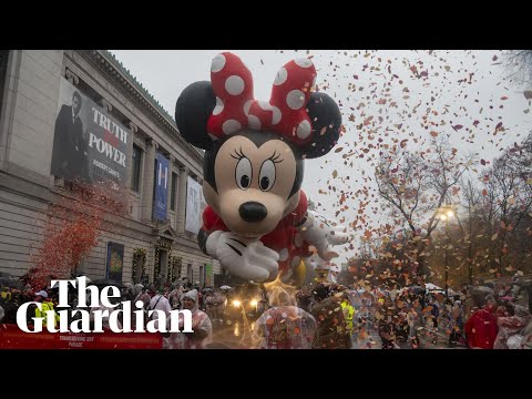 Thanksgiving Day parades march through New York and Chicago