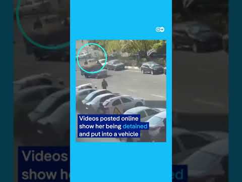 Young woman protests Iran’s dress code by stripping at university | DW News