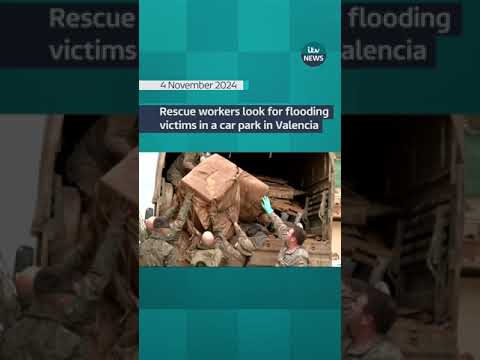 Rescue workers look for flooding victims in underground car park in Valencia #itvnews #shorts