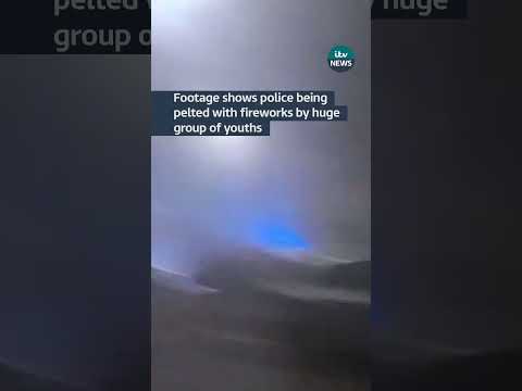 Bonfire night ‘warzone’ as car set alight and police attacked with fireworks #itvnews #manchester