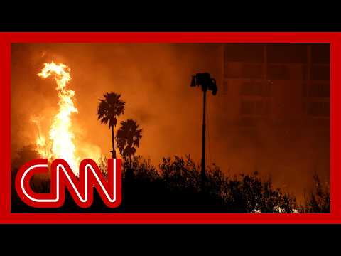 Wildfire nearly triples in size in one hour as it threatens college campus