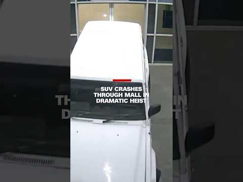 SUV crashes through mall in dramatic heist